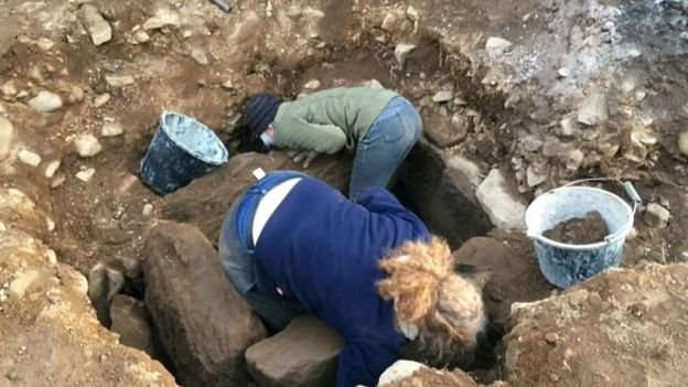 Human remains thought to be about 4,000 years old have been discovered by builders working on a hotel in rural Northumberland. The Tankerville Arms in Wooler was undergoing renovation work when they unearthed a Bronze Age stone burial chamber - or cist