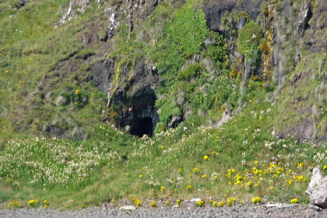 Around 400 members of the MacDonald clan were believed to have been suffocated in the cave (pictured) in 1577 after the MacLeods lit a fire outside the small entrance, filling the cave with smoke