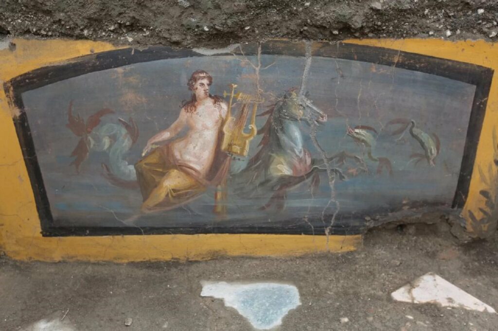 A painting of a scantily clad sea nymph graces the storefront of an ancient fast-food joint in Pompeii.
