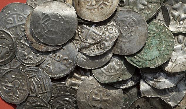 Researchers said that around 100 silver coins from the collection (pictured) are probably from the reign of Bluetooth, who was the king of what is now Denmark, northern Germany, southern Sweden and parts of Norway.