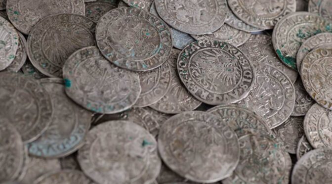 Hoard of Viking coins worth at least £500,000 found during police raids