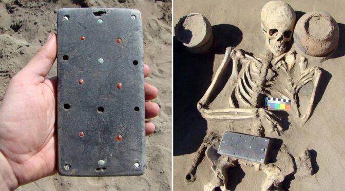 Archaeologists find an ancient skeleton buried with ‘2,100-year-old iPhone’