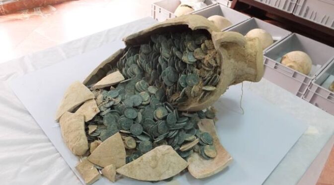 Construction Workers Stumble Across Old Pots With 1,300 Pounds Of Ancient Roman Coins Inside