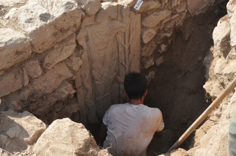 Unknown ancient god with astral symbols discovered on stele at cult site in Turkey