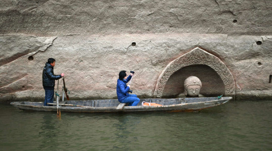 Archaeologists Investigate the Buddha Head at the Hongmen reserviour