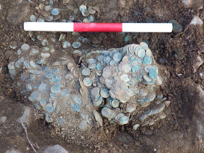 Amateur metal detector uncovers 22,000 Roman coins