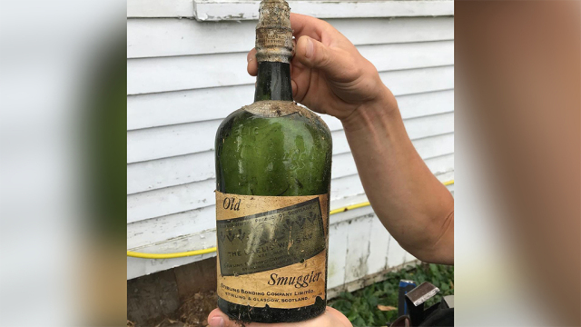 Couple finds more than 66 bottles of Prohibition-era whiskey hidden in the walls of their New York home