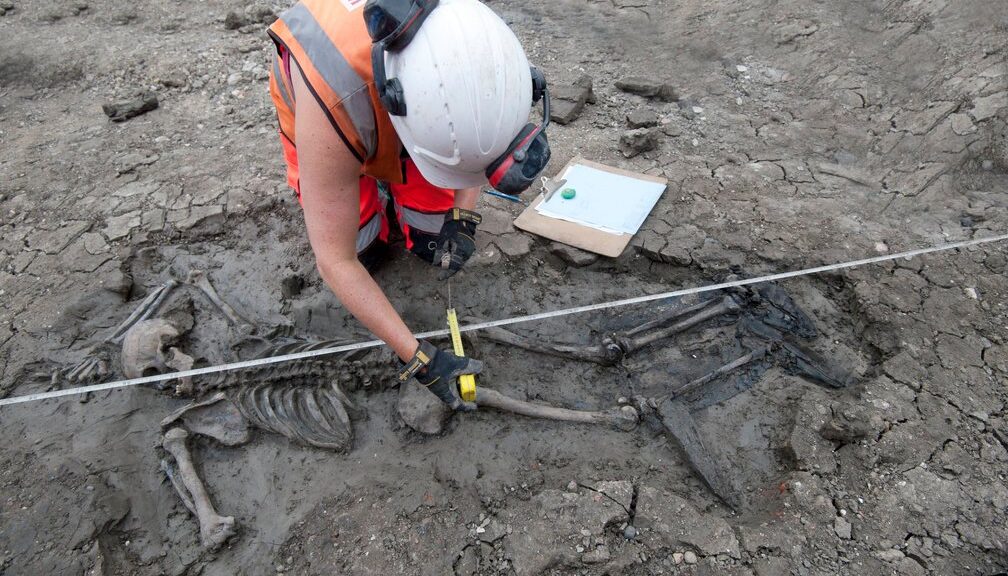 Archaeologists discover medieval skeleton with his boots still on in London