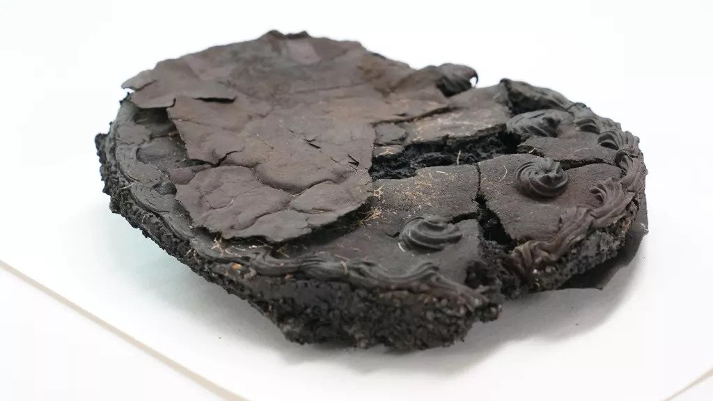 Blackened mummy cake found intact 79 years after WWII air raid