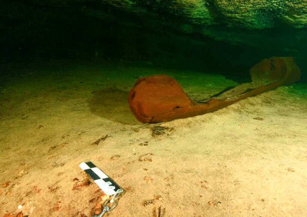 Rare 1,000-year-old canoe found in cenote near Chichén Itzá