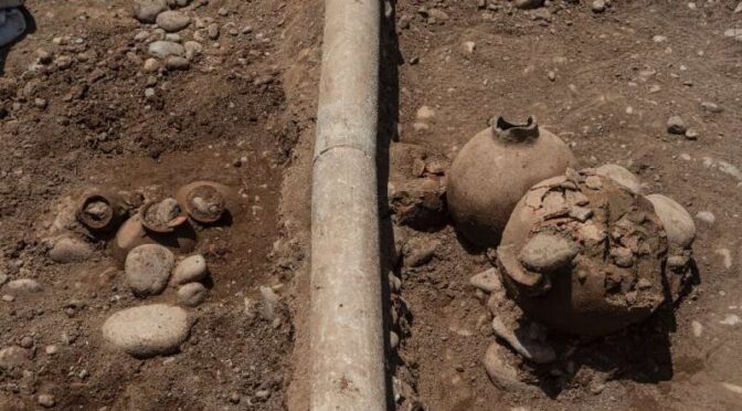 Workers digging gas pipes in Peru find the 2,000-year-old gravesite