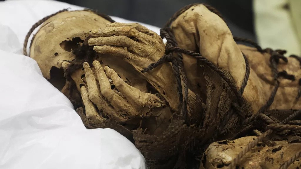 Archaeology breakthrough as 1,000-year-old mummy found in underground tomb 'bound by rope'