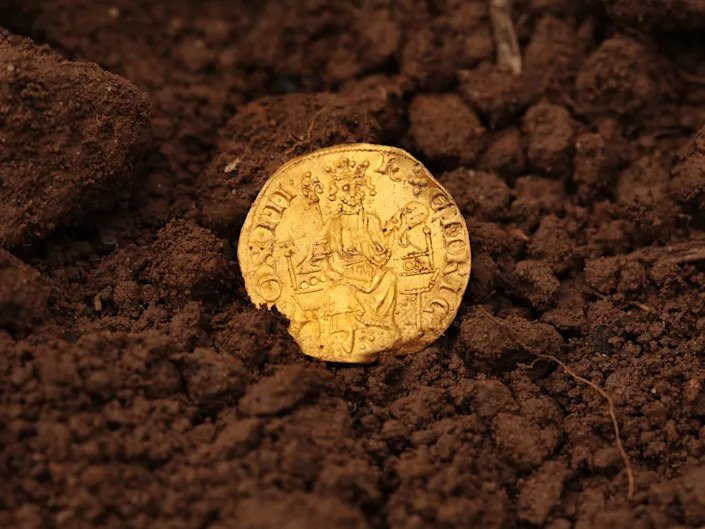 Father discovered a medieval English gold coin worth a record $875,000 on the first day he tried out his new metal detector