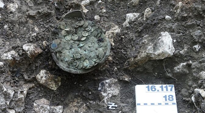 Treasure of 1,290 Ancient Roman Coins Discovered by Amateur Archaeologist in Switzerland