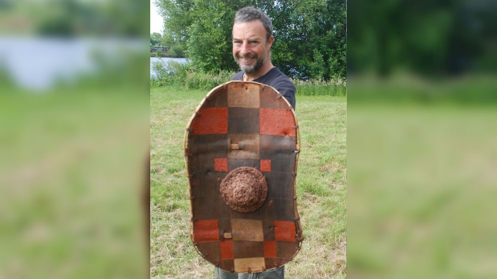 A 2,300-year-old Iron Age shield has been revealed by archaeologists.