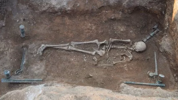 2,100-year-old burial of woman lying on bronze ‘mermaid bed’ unearthed in Greece