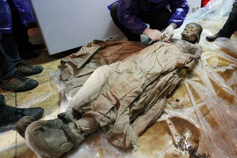 A perfectly preserved 700-year-old mummy in brown liquid looked only a few months old