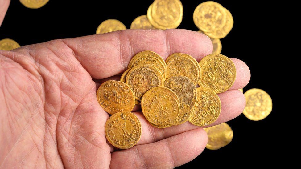 Byzantine gold coins hidden in a wall in the 7th century were uncovered by Israeli archaeologists