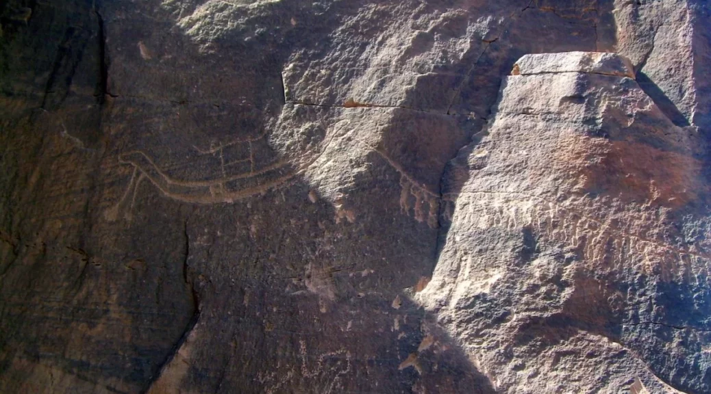 Staging of religion on rock paintings that are thousands of years old in southern Egypt desert