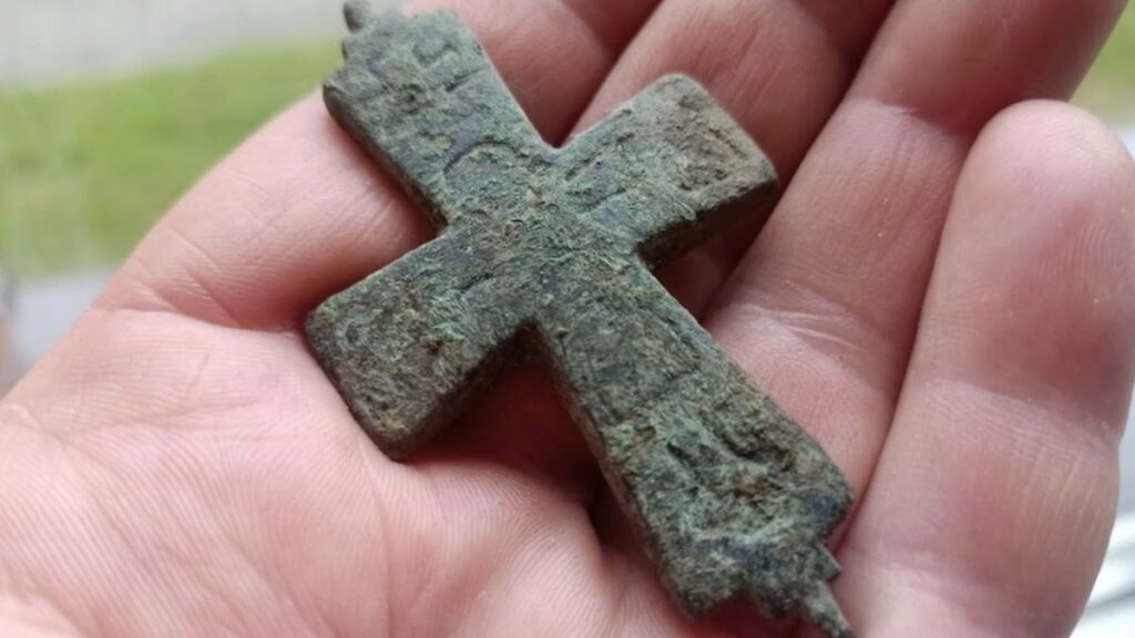 Rare cross-shaped reliquary unearthed from medieval knight's home in Poland
